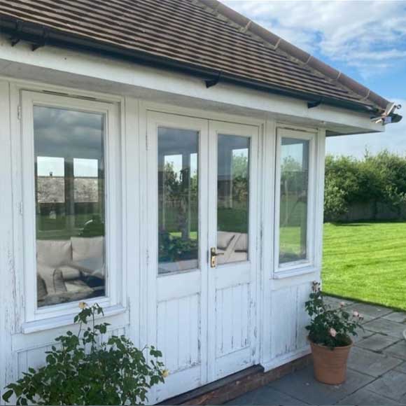 Origin bi-folding doors on a renovated garden room in Oxfordshire