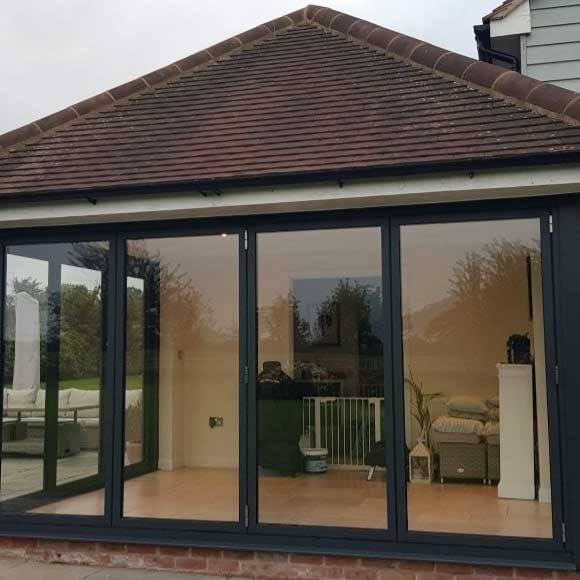 Origin bi-folding doors on a renovated garden room in Oxfordshire